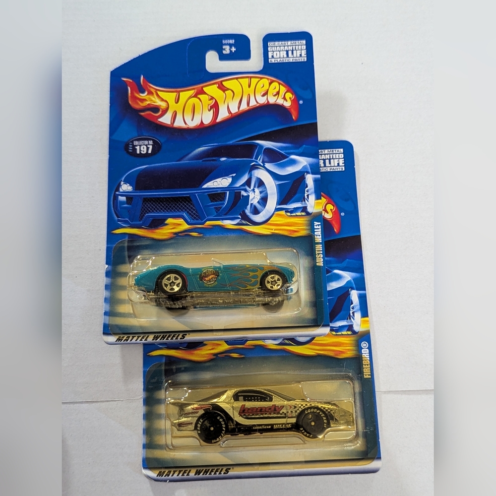 Two Sealed Hot wheels: Austin Healy Blue & Gold Car #197, Firebird Car # 121